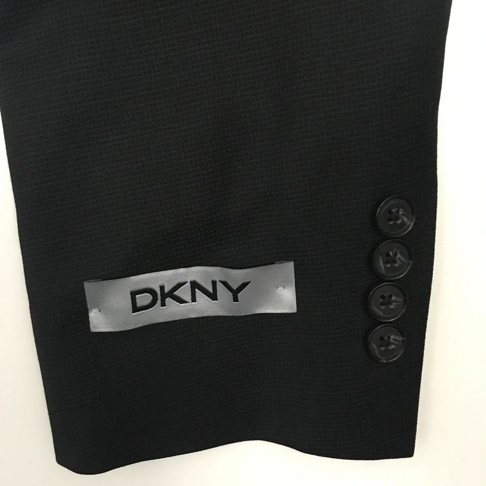 New dkny 2 piece 42r men’s suit black slim fit  2 button 100% wool nwt ea0060